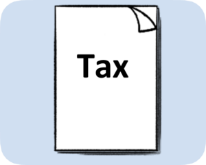 Several pieces of paper with the word 'tax' on te front piece